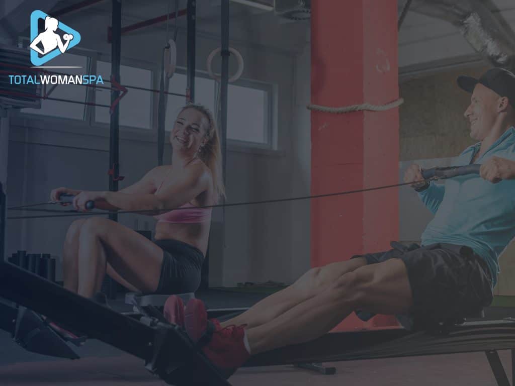 Fitness Couple Training with Rowing Machines