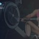 Woman Training with Air Rowing Machine