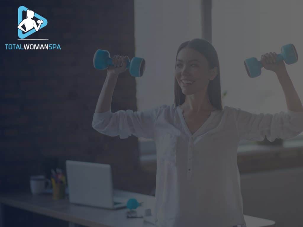 Woman Using Dumbbells in the Office