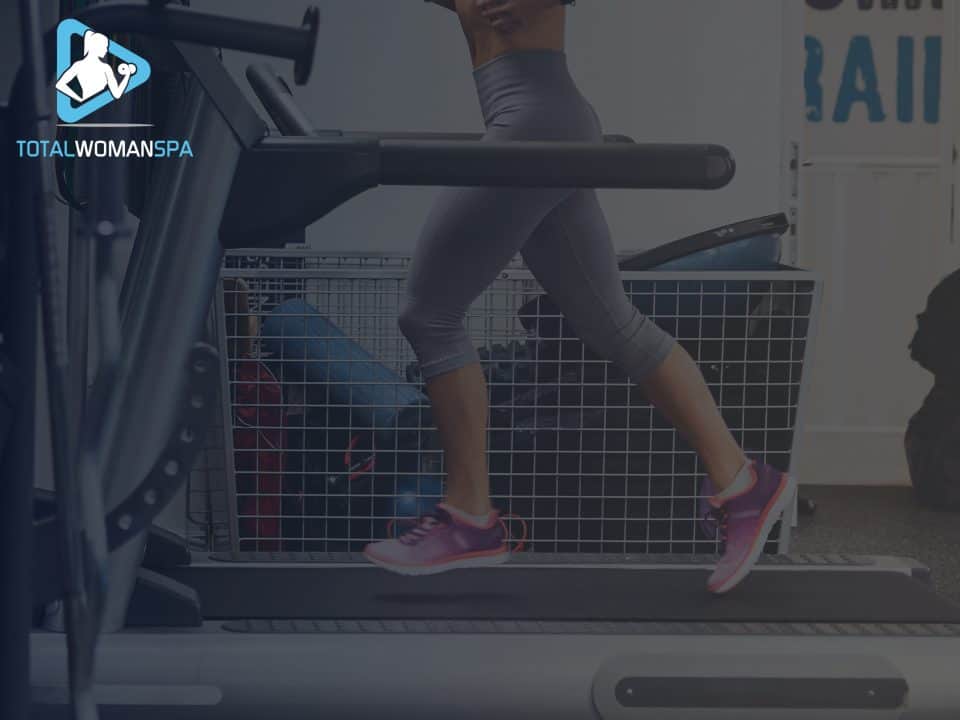 Young Woman Running on Treadmill