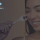 Woman Using Microneedling Tool on Her Face